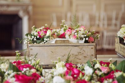 Close-up of pink roses on potted plant, floral arrangements for a wedding