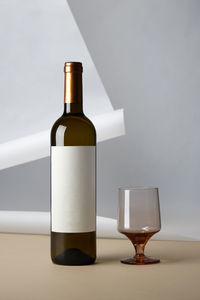 Close-up of wine bottles on table