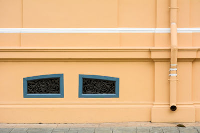 Closed window on wall of building