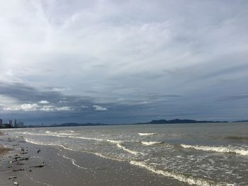 Scenic view of beach against sky