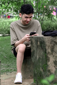 Young man using mobile phone