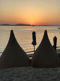 Scenic view of sea against sky during sunset at hippie fish mykonos 