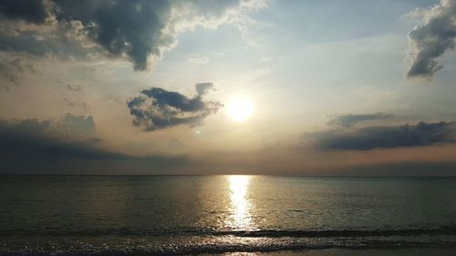 Scenic view of sea at sunset