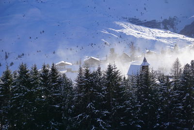 Scenic view of snow covered mountain against sky