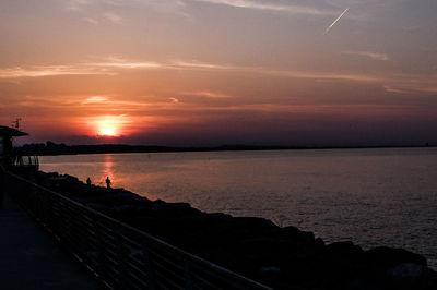 Scenic view of sea at sunset