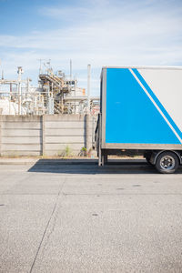 Lorry parked in front of industrial building