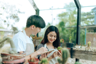 Young couple sitting on table at restaurant