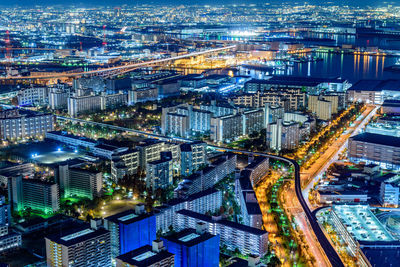 High angle view of illuminated cityscape at night