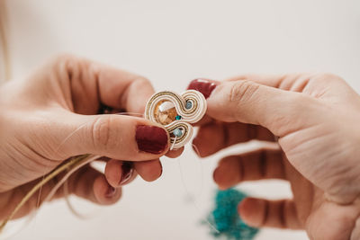 Close-up of woman holding hands