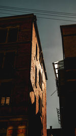 Low angle view of old building against sky
