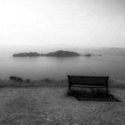 Empty bench on landscape