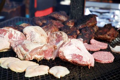 Close-up of meat on barbecue grill