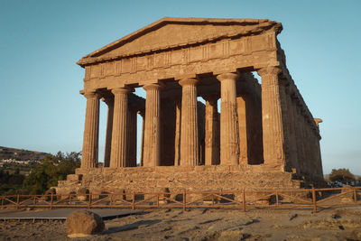 Old ruins of temple against clear sky