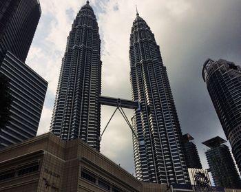 Low angle view of skyscrapers against sky