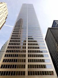 Low angle view of skyscrapers against sky