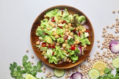 High angle view of chopped fruits in bowl on table