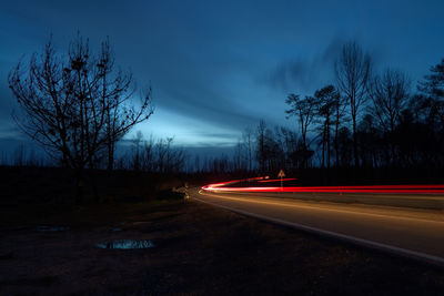 Light trails on road at night