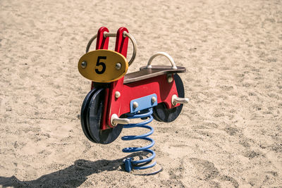 High angle view of toy car on sand
