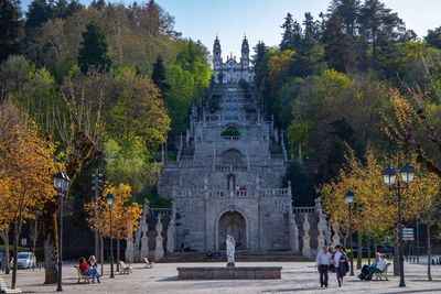 Group of people in temple during autumn