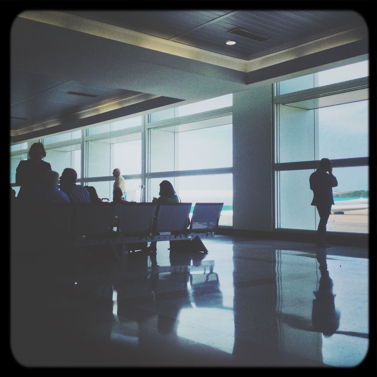 indoors, men, silhouette, window, lifestyles, person, glass - material, sitting, airport, leisure activity, reflection, chair, transparent, medium group of people, full length, rear view, waiting, restaurant