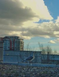 Built structure against cloudy sky