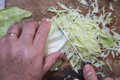 High angle view of hand holding food