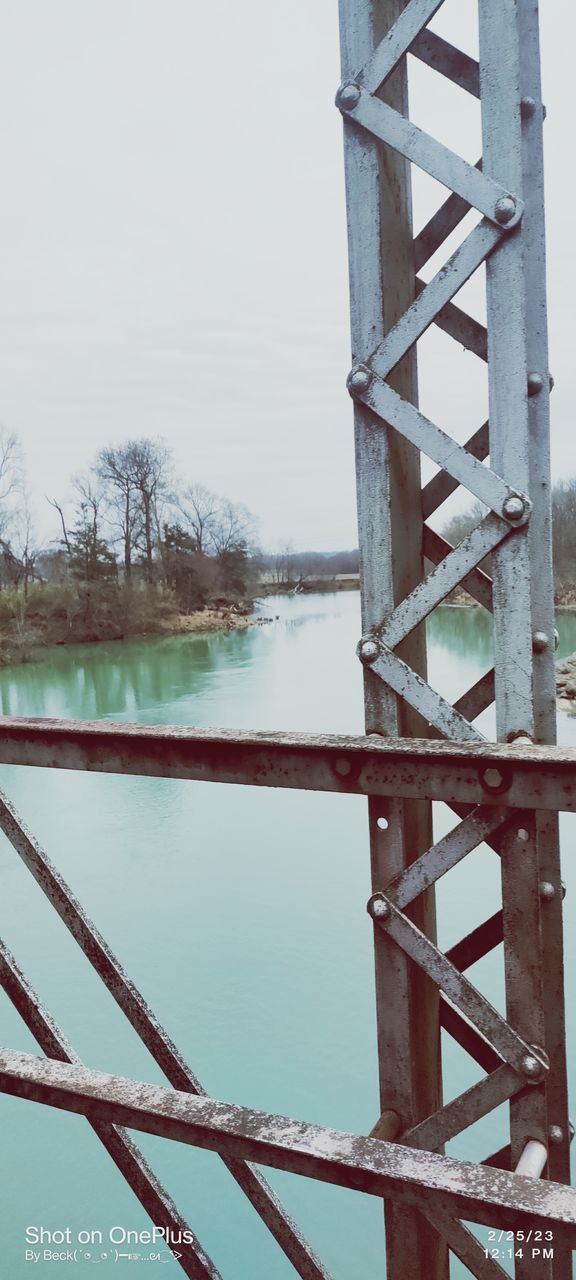 water, architecture, built structure, nature, sky, tower, day, no people, outdoors, iron, bridge, winter, wood, tranquility, lake, tree, beauty in nature, snow