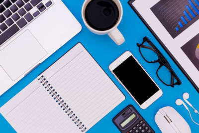 High angle view of coffee cup on table