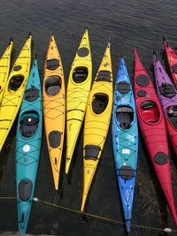 High angle view of colorful canoes at lake