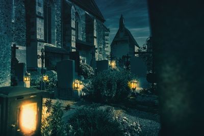 Illuminated buildings in city at night