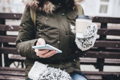 Close-up of woman using mobile phone