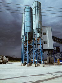 View of tower against cloudy sky