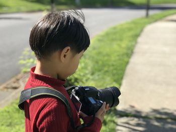 Portrait of girl photographing