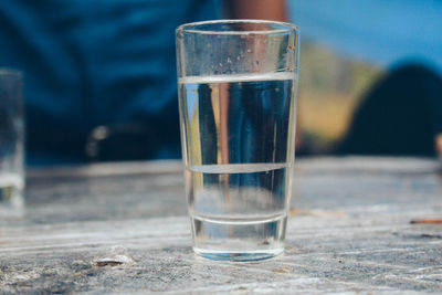 Close-up of beer glass on table