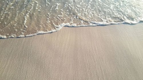 High angle view of surf at beach