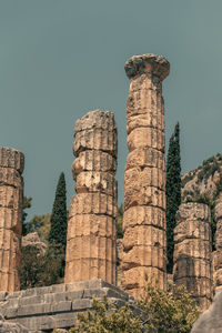 Low angle view of old ruins against clear sky