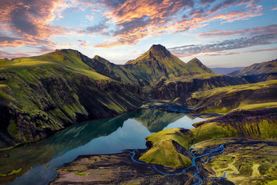 Scenic view of lake against sky during sunset