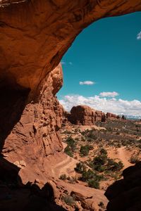 View of rock formations against blue sky during sunny day