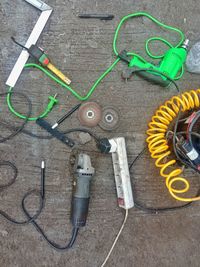 High angle view of chain on metallic structure