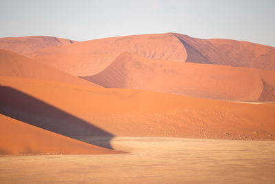 Scenic view of desert against clear sky