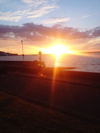 Scenic view of sea at sunset