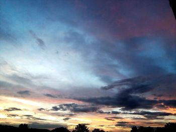 Low angle view of dramatic sky during sunset