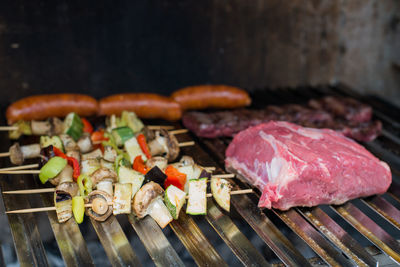 Close-up of meat on barbecue grill