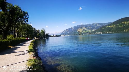 Scenic view of lake against blue sky