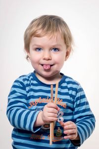 Portrait of cute boy holding ball