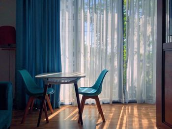 Empty chairs and table at home