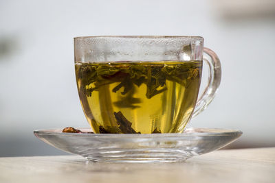 Close-up of tea in glass on table