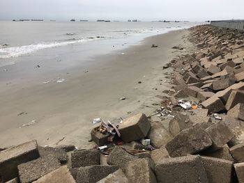 Scenic view of beach against sky