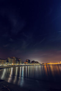 View of illuminated city at night