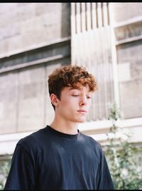 Portrait of young man looking away